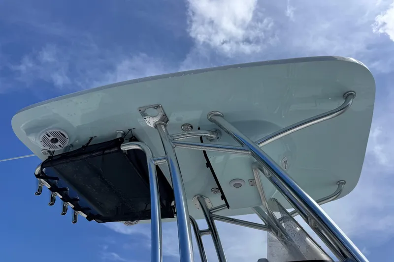Slide: The Image of T-top of 2026 Key West 239 FS boat against a clear blue sky. - 9