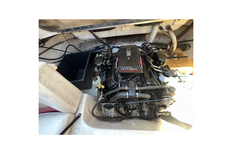 Slide: The Image of Engine compartment of a 1996 Rinker 232 Captiva Cuddy with 7.4L V8 Bravo engine. - 17