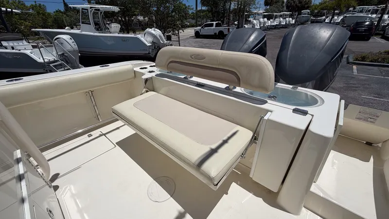 Slide: The Image of 2015 Cobia 296 Center Console with seating and engines. - 11