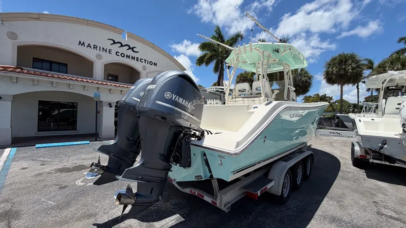Slide: The Image of 2015 Cobia 296 Center Console boat at Marine Connection. - 20