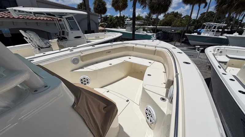 Slide: The Image of 2015 Cobia 296 Center Console boat with spacious deck. - 6