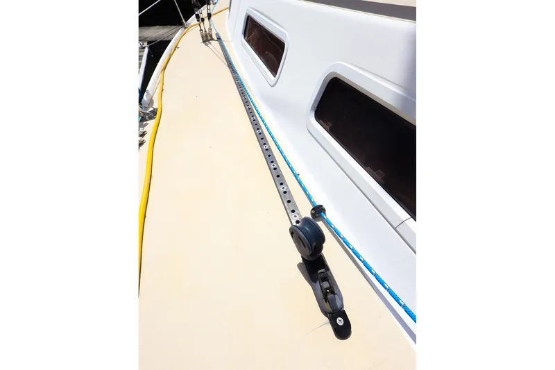 Slide: The Image of 1998 J Boats J/32 deck with rigging and windows, showcasing sleek design. - 16