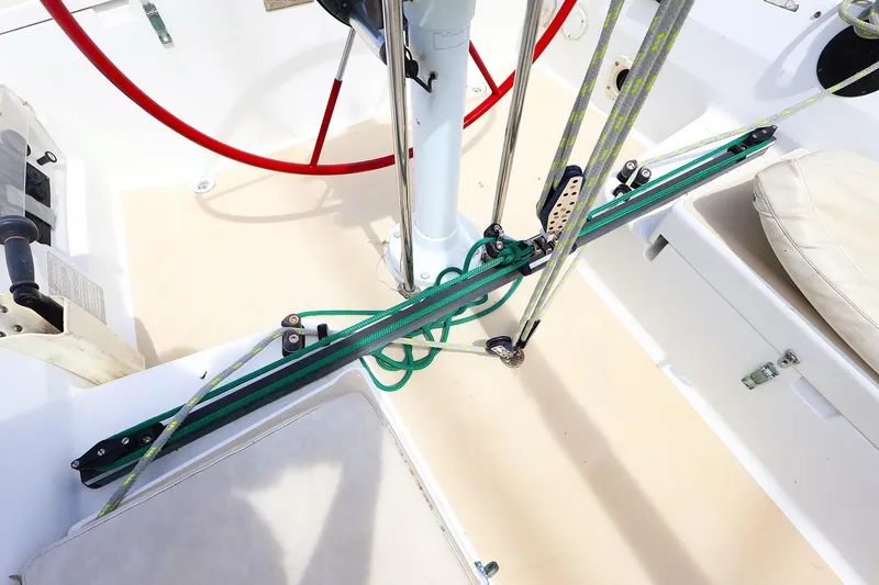 Slide: The Image of Cockpit of 1998 J Boats J/32 sailboat with steering wheel and rigging details. - 18