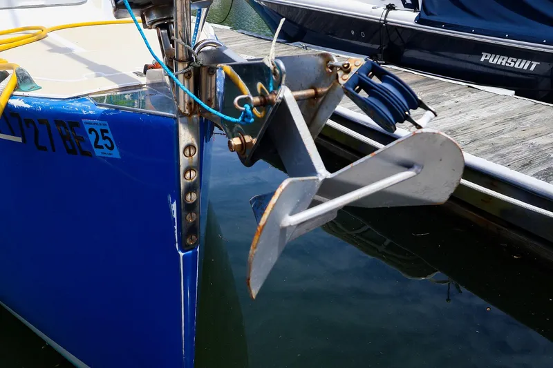 Slide: The Image of Bow of a 1998 J Boats J/32 with anchor, docked in marina. - 5