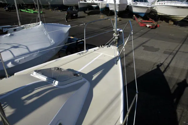 Slide: The Image of 1998 J Boats J/32 sailboat on a dry dock. - 7