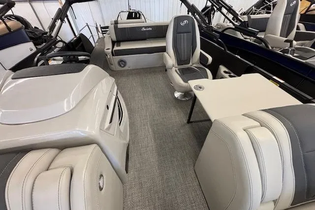 Slide: The Image of 2026 Barletta Corsa 23UC pontoon boat interior with seating and table. - 13