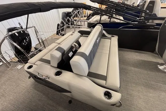 Slide: The Image of 2026 Barletta Corsa 23UC pontoon boat interior with plush seating and cup holders. - 17