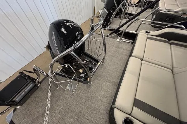 Slide: The Image of 2026 Barletta Corsa 23UC pontoon boat interior with seating and Mercury outboard motor. - 19
