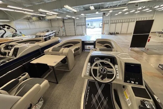 Slide: The Image of 2026 Barletta Corsa 23UC pontoon boat interior with modern helm and seating. - 22