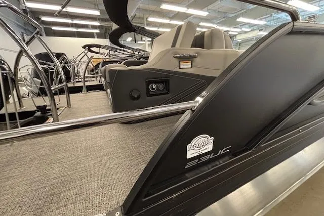 Slide: The Image of 2026 Barletta Corsa 23UC pontoon boat interior with sleek design and modern seating. - 6