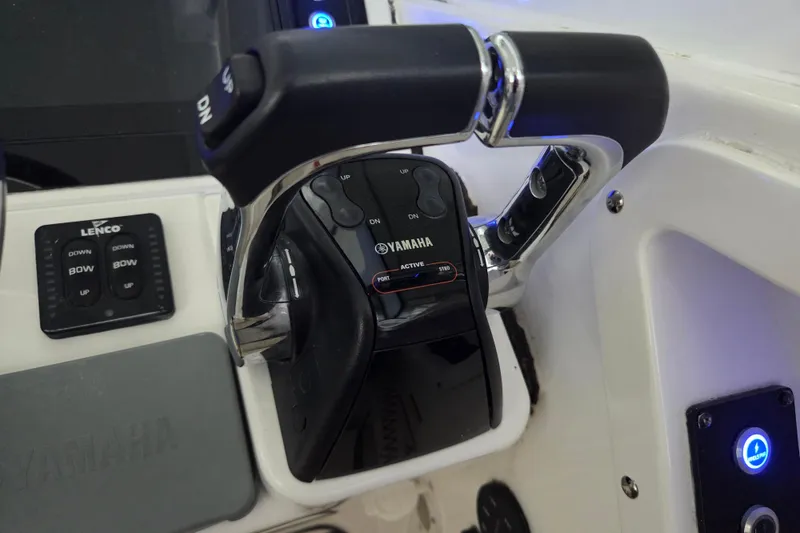 Slide: The Image of Close-up of 2019 Edgewater 262CX Crossover boat controls with Yamaha throttle. - 22