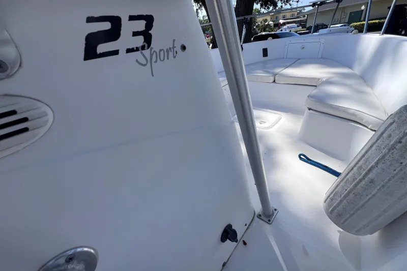 Slide: The Image of 2006 Pro-Line 23 Sport boat interior with seating and logo visible. - 16