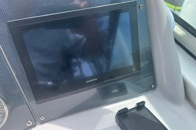 Slide: The Image of Garmin display on 2004 Formula 370 Super Sport dashboard, close-up view. - 11