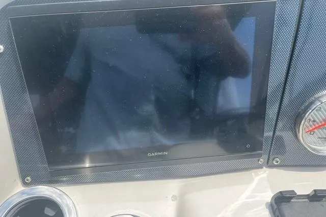 Slide: The Image of Garmin display on 2004 Formula 370 Super Sport boat dashboard. - 12