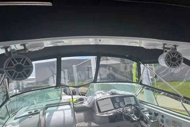 Slide: The Image of Interior view of a 2004 Formula 370 Super Sport boat cockpit with Garmin navigation. - 13