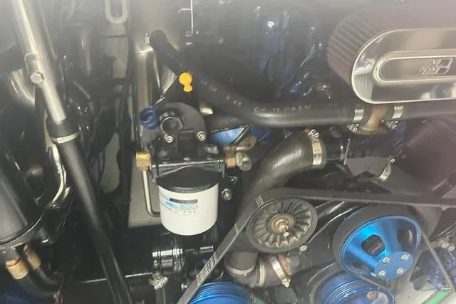 Slide: The Image of Engine components of a 2004 Formula 370 Super Sport boat. - 24