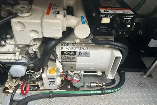 Slide: The Image of Engine compartment of a 2004 Formula 370 Super Sport with Kohler power systems. - 26