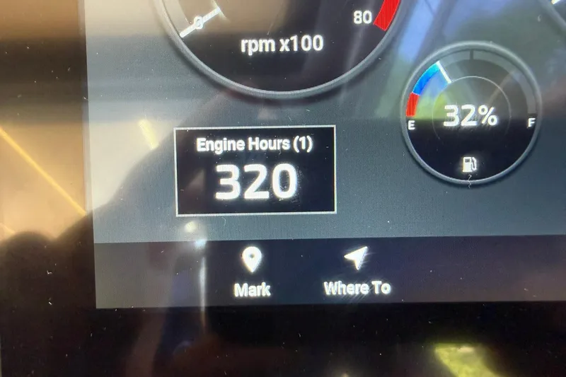 Slide: The Image of Dashboard of 2024 Hanover 387 showing 320 engine hours and 32% fuel level. - 18