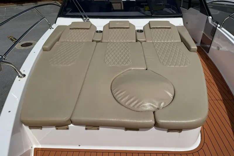 Slide: The Image of Luxurious beige leather seating on 2024 Hanover 387 boat deck. - 22