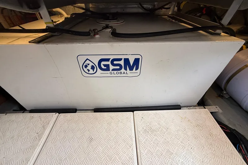 Slide: The Image of 2024 Hanover 387 engine compartment with GSM Global branding. - 39