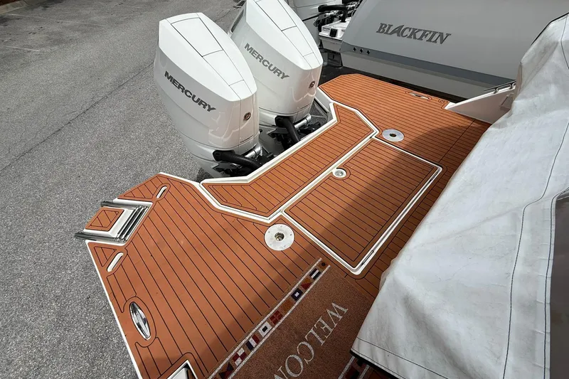 Slide: The Image of 2024 Hanover 387 boat with Mercury engines and teak deck. - 4