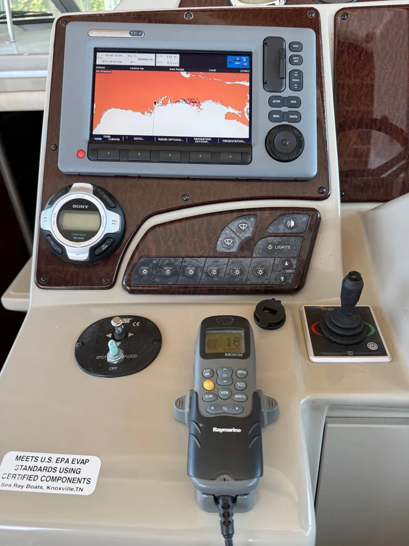Slide: The Image of Sea Ray Sundancer 350 2012 helm with navigation system and controls. - 11