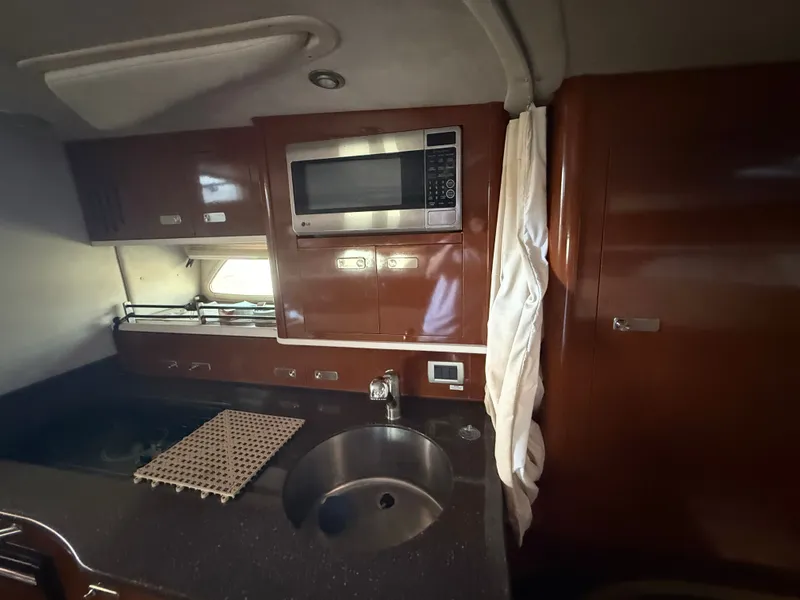 Slide: The Image of Interior of Sea Ray Sundancer 350 yacht kitchen, 2012 model. - 23