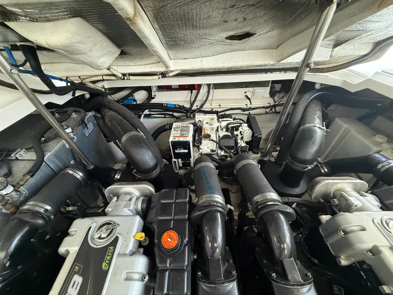 Slide: The Image of Engine compartment of 2012 Sea Ray Sundancer 350 with V8 engine. - 31