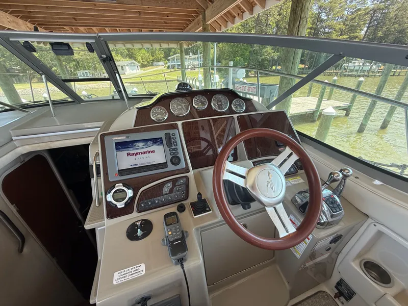 Slide: The Image of 2012 Sea Ray Sundancer 350 helm with Raymarine navigation system. - 6