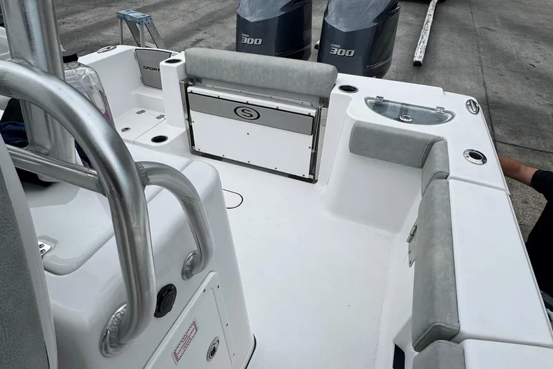 Slide: The Image of 2020 Sportsman Open 282TE Center Console boat interior with dual Yamaha 300 engines. - 12