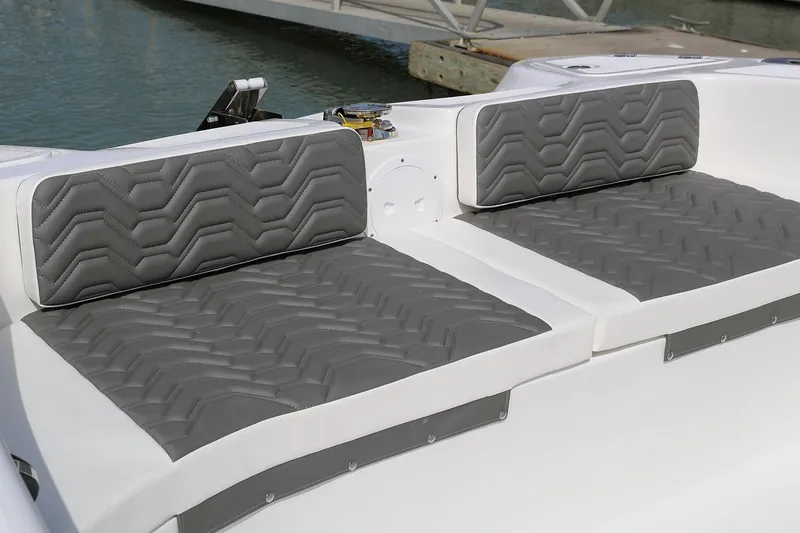 Slide: The Image of Manufacturer Provided Image: 2021 Twin Vee 280 CC GF boat with gray cushioned seating. - 15
