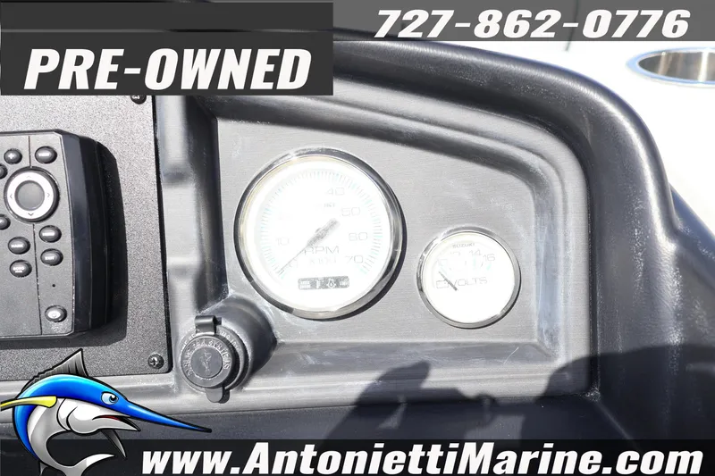 Slide: The Image of Dashboard of a pre-owned 2026 Bentley Pontoons Legacy 243 Swingback boat. - 11