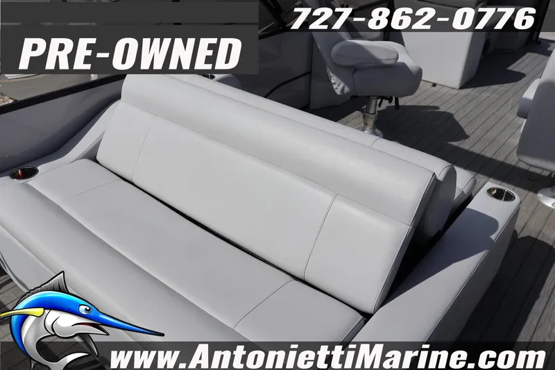 Slide: The Image of Pre-owned 2026 Bentley Pontoons Legacy 243 Swingback with comfortable seating and cup holders. - 15