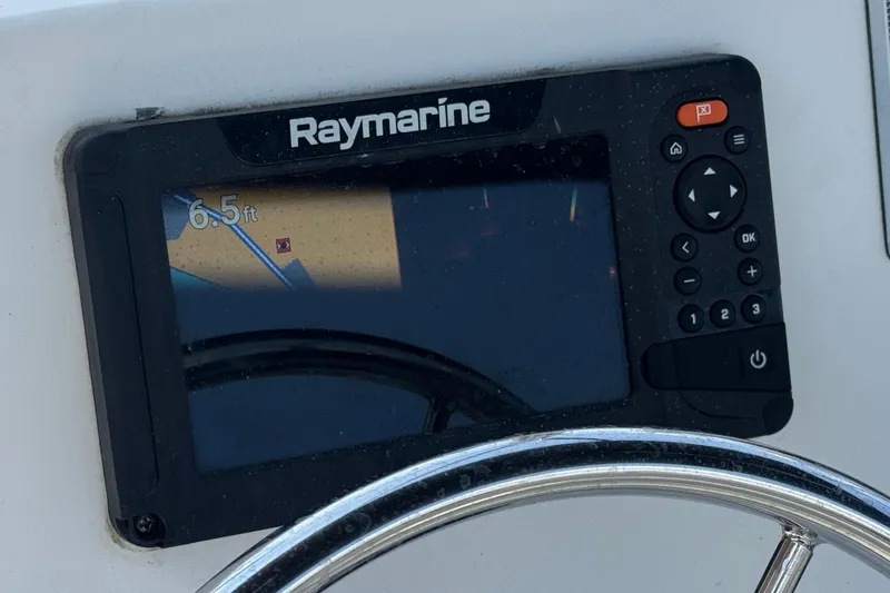 Slide: The Image of Raymarine display on 2019 Boston Whaler 150 Montauk showing 6.5 ft depth. - 20