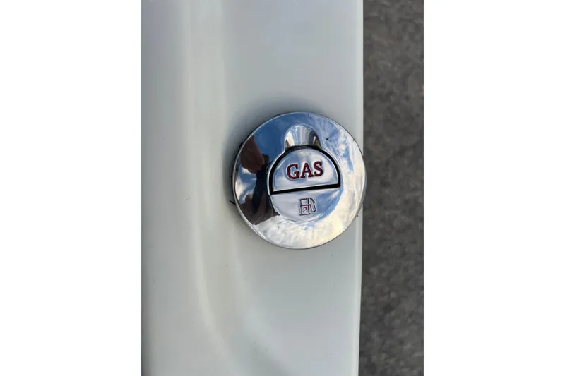 Slide: The Image of Chrome gas cap on 2010 Dusky 256 Center Console boat. - 34
