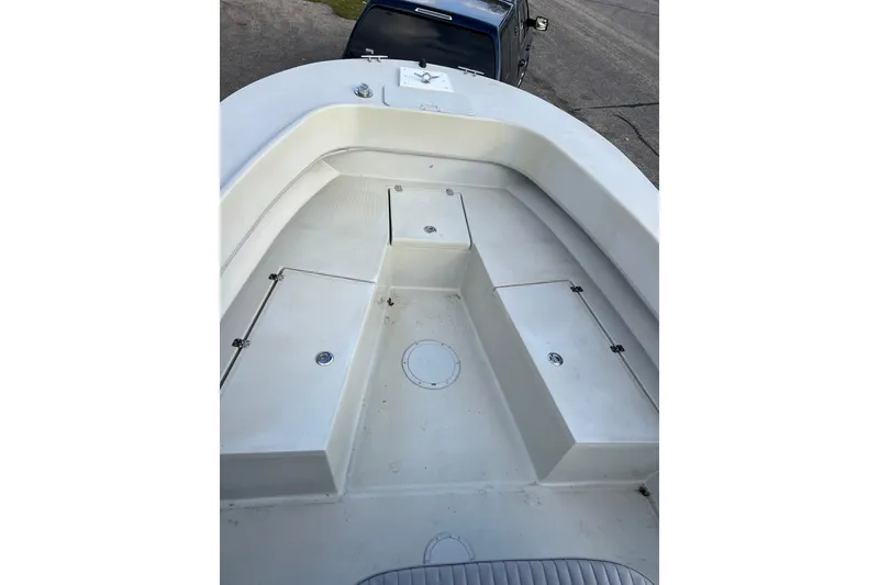 Slide: The Image of 2010 Dusky 256 Center Console boat deck, spacious and clean design. - 35
