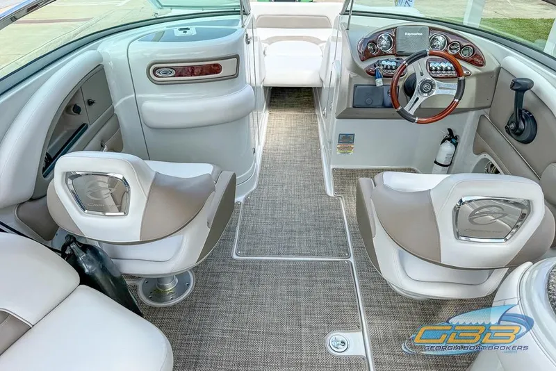Slide: The Image of 2015 Crownline Eclipse E6 boat interior with modern dashboard and seating. - 10