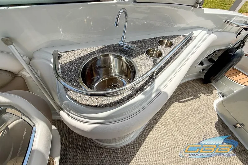 Slide: The Image of 2015 Crownline Eclipse E6 boat interior with sink and countertop. - 12
