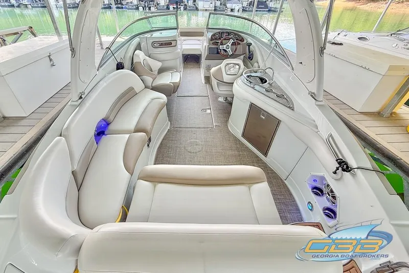 Slide: The Image of 2015 Crownline Eclipse E6 boat interior with spacious seating and modern dashboard. - 3