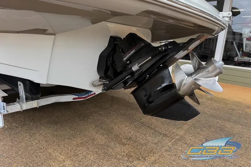 Slide: The Image of 2015 Crownline Eclipse E6 boat with MerCruiser outdrive and stainless steel propeller. - 34