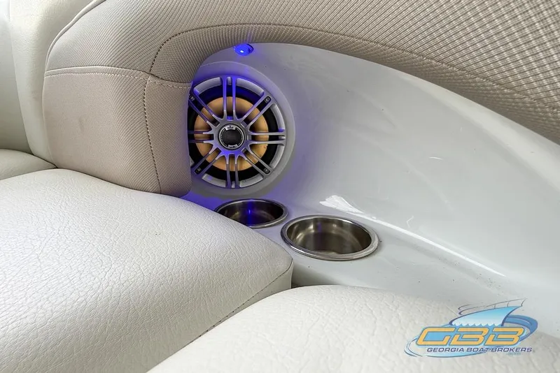 Slide: The Image of 2015 Crownline Eclipse E6 boat interior with speaker and cup holders. - 45