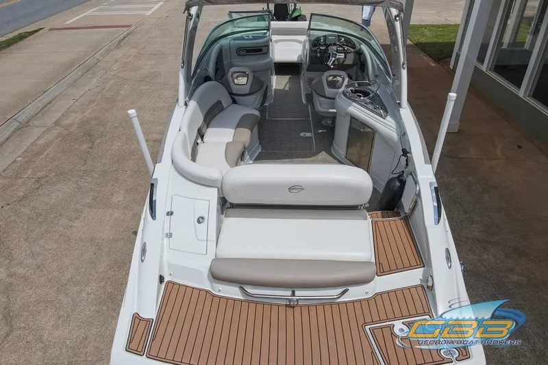 Slide: The Image of 2015 Crownline Eclipse E6 boat with spacious seating and modern interior design. - 9