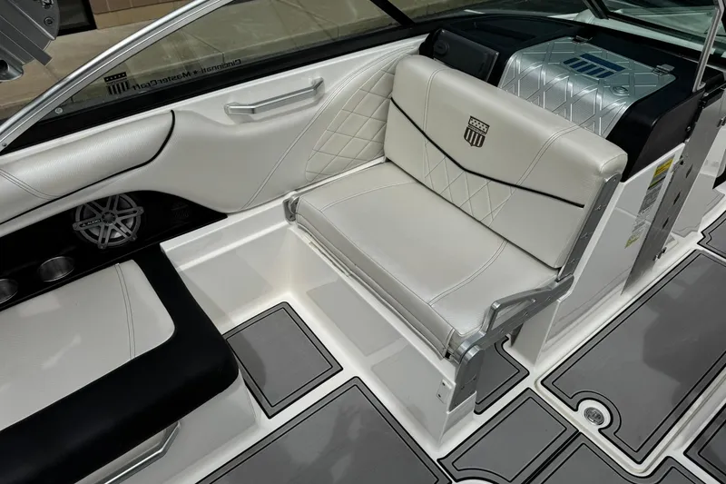 Slide: The Image of 2014 MasterCraft X-35 interior with white leather seating and modern design elements. - 17