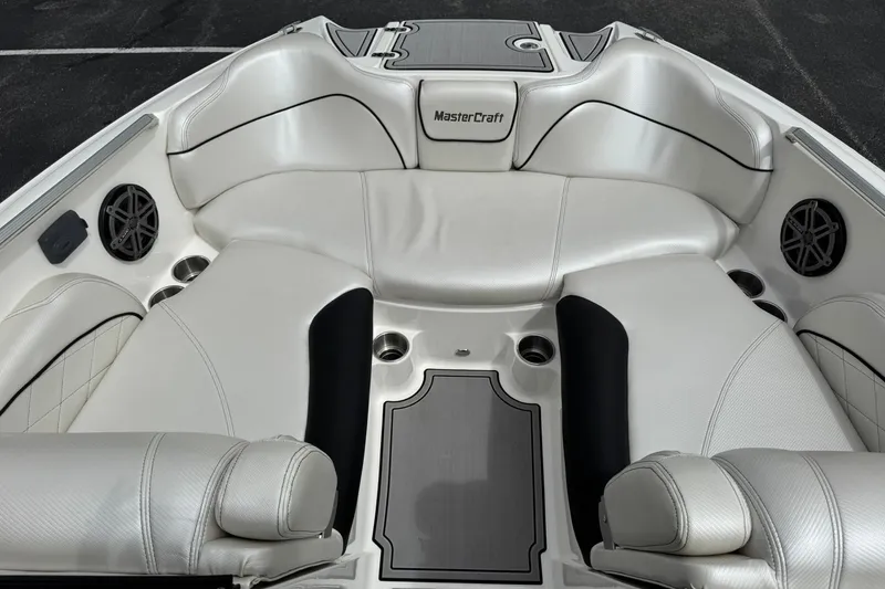 Slide: The Image of Luxurious interior of 2014 MasterCraft X-35 boat with white leather seating and cup holders. - 18