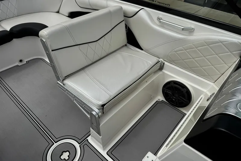 Slide: The Image of 2014 MasterCraft X-35 interior with white seating and speaker detail. - 22