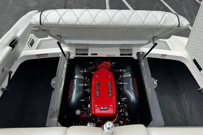 Slide: The Image of 2014 MasterCraft X-35 boat engine compartment with Ilmor engine visible. - 27