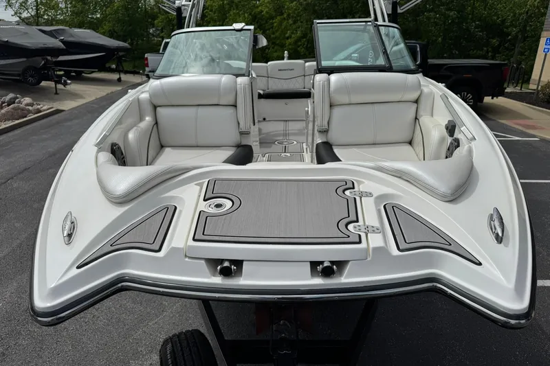 Slide: The Image of 2014 MasterCraft X-35 boat with sleek white interior and modern design. - 8