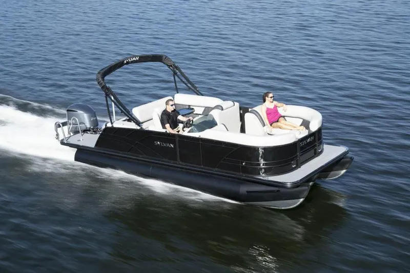 Slide: The Image of Manufacturer Provided Image: 2022 Sylvan Mirage X X3 CLZ pontoon boat cruising on a lake. - 7
