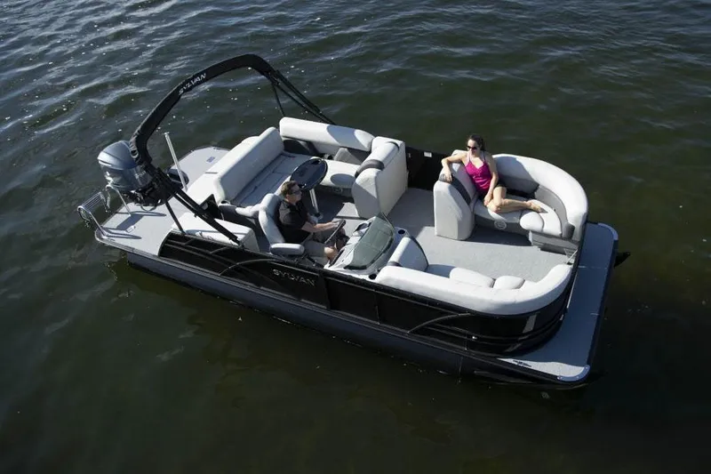 Slide: The Image of Manufacturer Provided Image: 2022 Sylvan Mirage X X3 CLZ pontoon boat on water with two passengers. - 9
