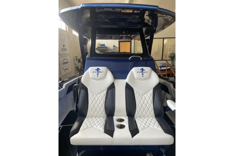Slide: The Image of Luxury seating on 2027 Statement 350 Open boat, featuring stylish design and comfort. - 14